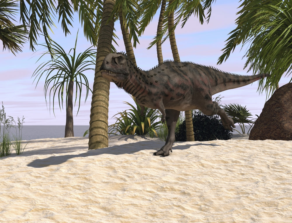 Majungasaurus running across a tropical landscape poster print