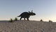Triceratops walking across a barren landscape poster print