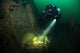 Diver discovering a box of ammunition at the wreck of the German escort ship V 1605 poster print.