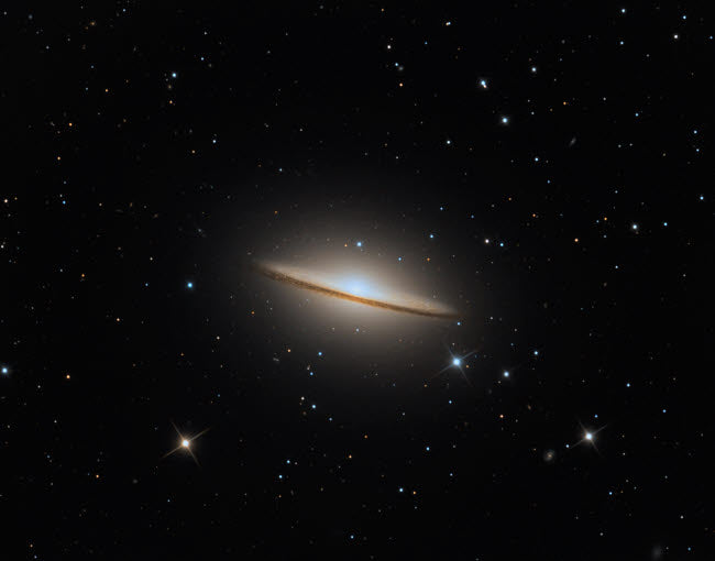 The Sombrero Galaxy Poster Print showcasing vibrant cosmic colors