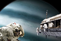 Astronauts working on a space station orbiting a Jupiter-like alien planet poster print.