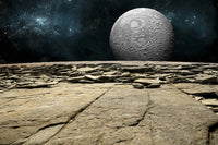 Alien Landscape Poster Print with a cratered moon over a rocky world.