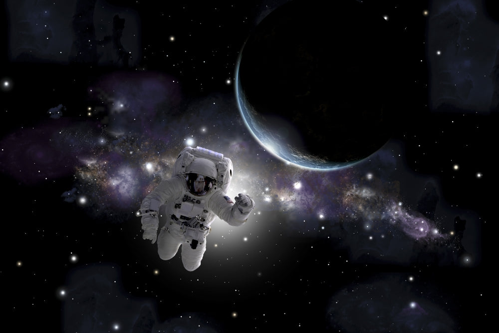 Astronaut floating in outer space with Earth sunrise poster print.