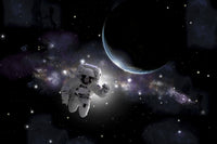 Astronaut floating in outer space with Earth sunrise poster print.