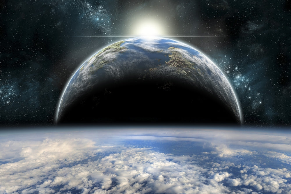 Twin Planets Sunrise Poster Print showcasing a cosmic scene with clouds and water.