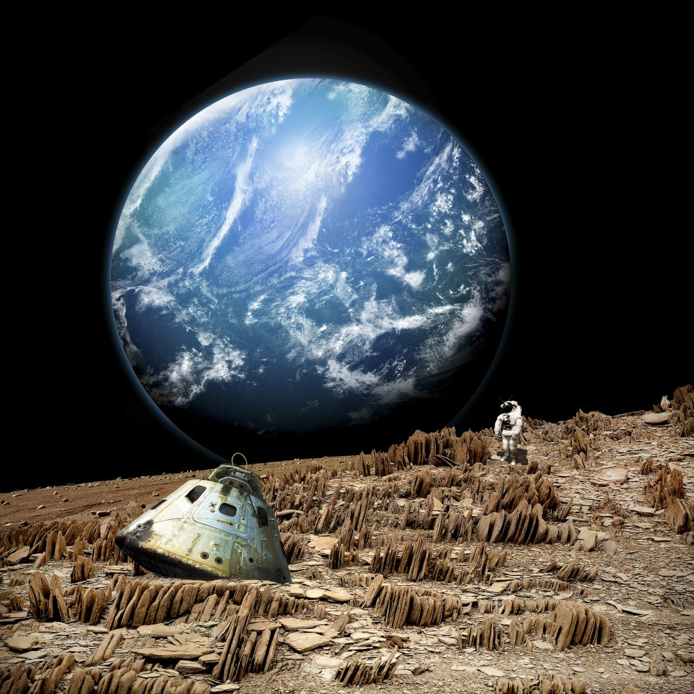 Astronaut on Barren Moon Poster Print with alien planet background