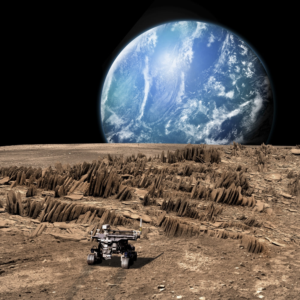 Rover exploring a rocky moon with a water-covered world in the background.