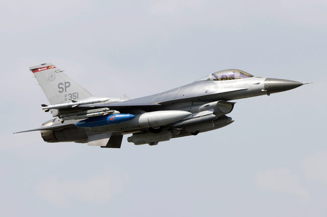 F-16 Fighting Falcon in flight over Italy poster print by Luca Nicolotti.