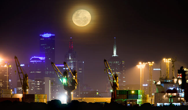 Moonrise over Melbourne city skyline poster print by Philip Hart.