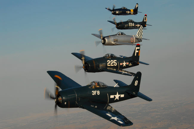 Formation of Grumman F8F Bearcats flying over Chino, California Poster Print