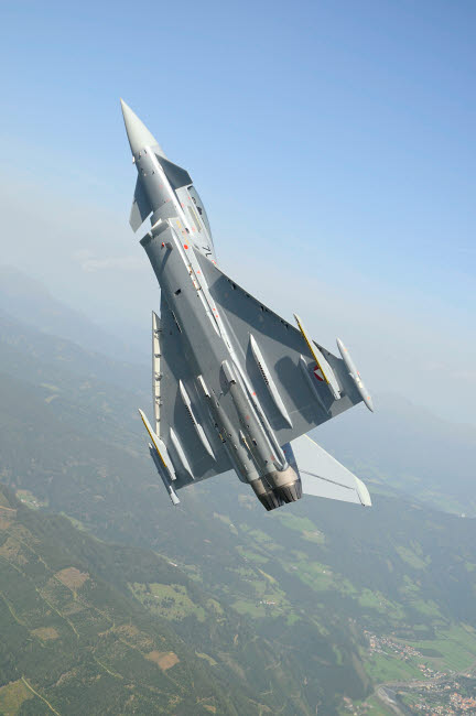 Austrian Air Force EF2000 Typhoon over the Austrian Alps Poster Print by Riccardo Niccoli