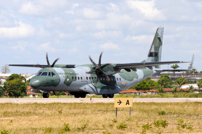 Brazilian Air Force C-105 on the runway at Natal Air Force Base Poster Print by Riccardo Niccoli.