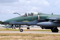 Brazilian Air Force A-1A (AMX) taxiing at Natal Air Force Base poster print by Riccardo Niccoli.