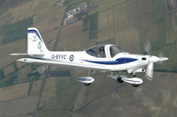 G-115 Tutor of the Cambridge University Air Squadron poster print featuring an in-flight view over England.