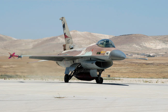 Israeli Air Force F-16A Netz taxiing at Nevatim Airbase Poster Print by Riccardo Niccoli.