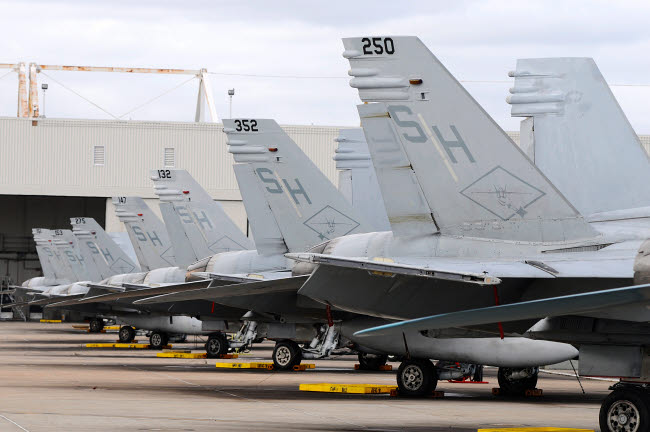 US Marine Corps F/A-18 Hornet tail fins poster print by Riccardo Niccoli.
