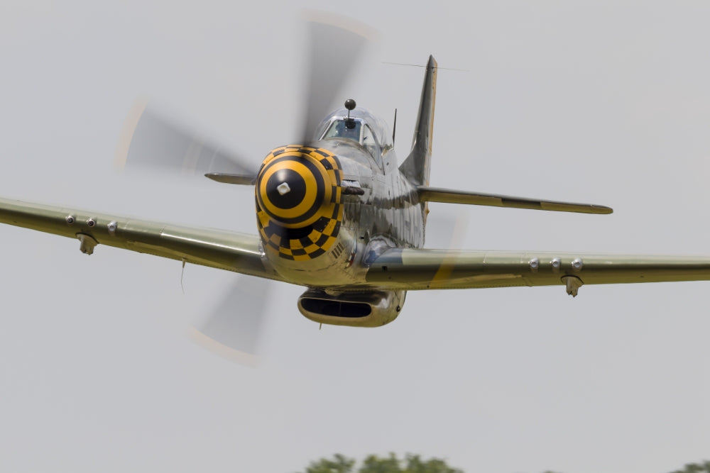 P-51 Mustang flying over East Troy, Wisconsin poster print.