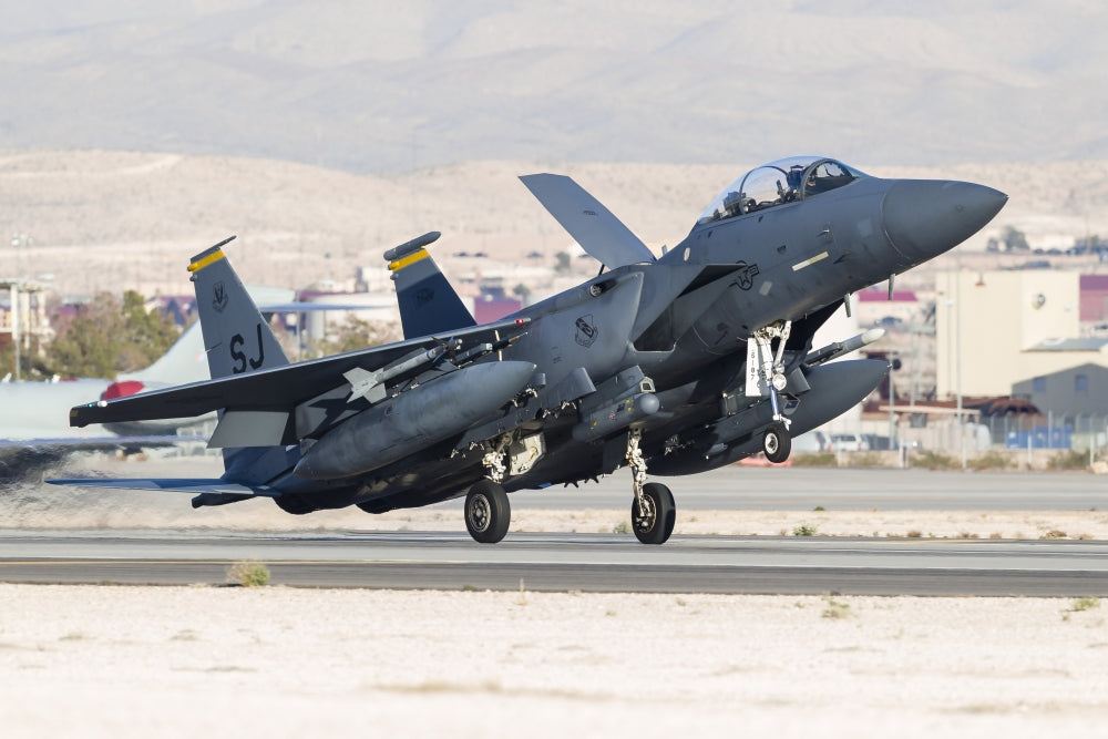 F-15E Strike Eagle landing at Nellis Air Force Base poster print.
