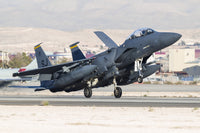 F-15E Strike Eagle landing at Nellis Air Force Base poster print.