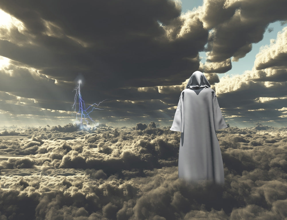 Figure in Cloak Stands on Field of Clouds Poster Print by Bruce Rolff.