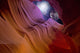 Desert Canyon Night Poster Print featuring a moon and galaxy in the sky by Bruce Rolff.