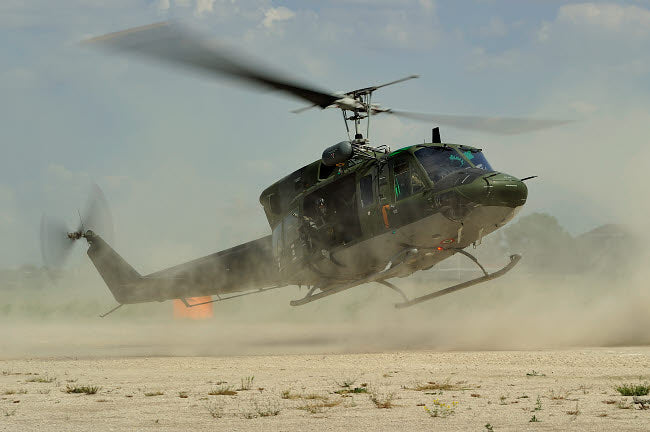 Agusta Bell AB 212 Landing Poster Print by Remo Guidi
