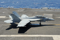 F/A-18 Hornet landing aboard USS Eisenhower poster print by Remo Guidi