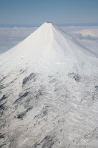 Aerial view of glaciated Shishaldin Volcano on Unimak Island, Alaska.