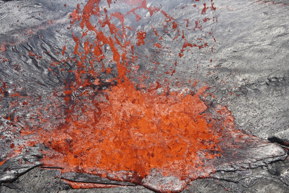 Lava bubble bursting through the crust of Erta Ale volcano in Ethiopia.