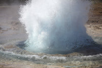 Bursting water bubble at Strokkur Geysir eruption in Iceland.
