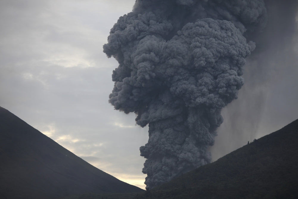Ash cloud rising from Tompaluan crater at Lokon-Empung volcano, Indonesia poster print.