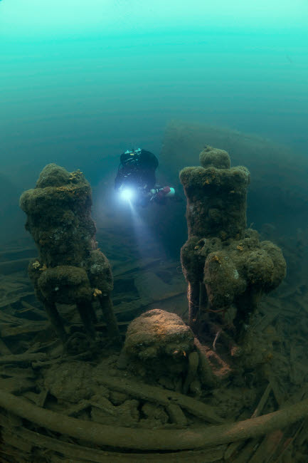Diver exploring the wreck of the SS Laurentic ocean liner underwater poster print.
