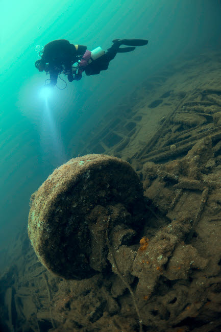 Diver exploring the wreck of the SS Laurentic ocean liner sunk during WW1 poster print.