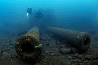 The Wrecks of Malin Head Poster Print by Steve Jones showcasing coastal scenery.