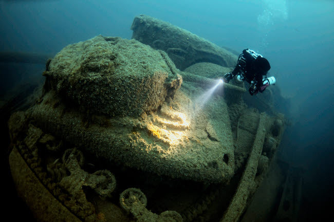 Diver Exploring the SS Empire Heritage Shipwreck Poster Print