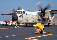 Signalman giving launch signal to a C-2A Greyhound poster print.