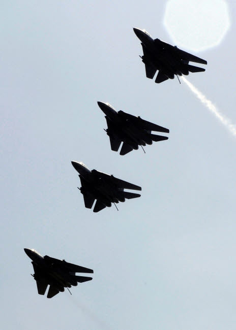 Four F-14D Tomcats in flight poster print showcasing military aircraft in action.