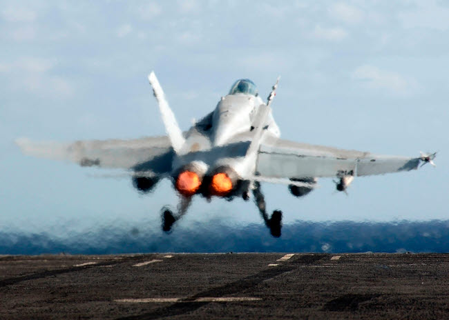 F/A-18C Hornet launching from USS Enterprise poster print.