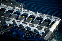 Jets on Aircraft Carrier Poster Print showcasing military jets in action.