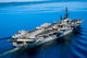 Aircraft Carrier in Calm Water Poster Print showcasing military strength and tranquility.