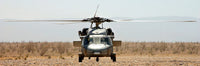 MH-60S Seahawk poster print showcasing a helicopter idling in a landing area.