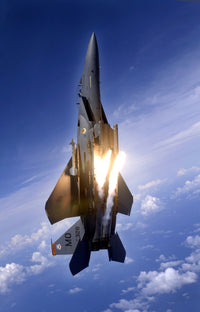 F-15E Strike Eagle pops flares during aerial training over Guam poster print.