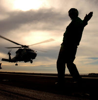 SH-60 Seahawk launching from USS Harry S Truman poster print