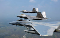 Three F/A-22 Raptors flying in formation poster print.