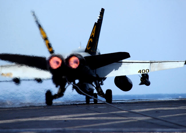 F/A-18C Hornet landing on USS Harry S Truman poster print.