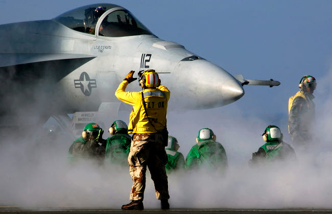 F/A-18E Super Hornet Launch Preparation Poster Print by Stocktrek Images