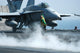 Aviation Boatswain's Mate signaling F/A-18C Hornet on USS George Washington