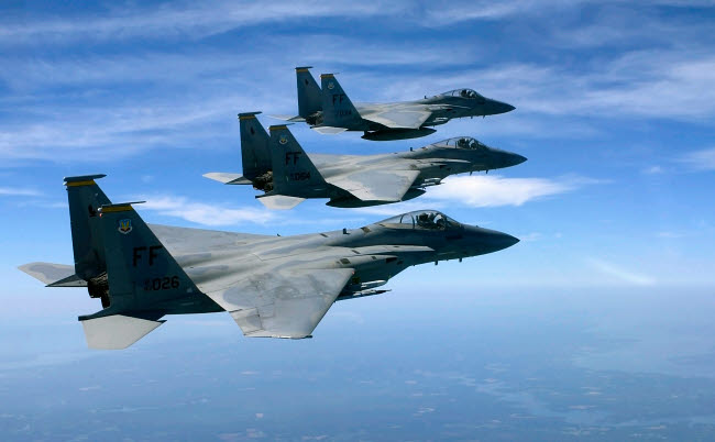 The F-15 Eagle's final training mission poster print over the Atlantic Ocean.