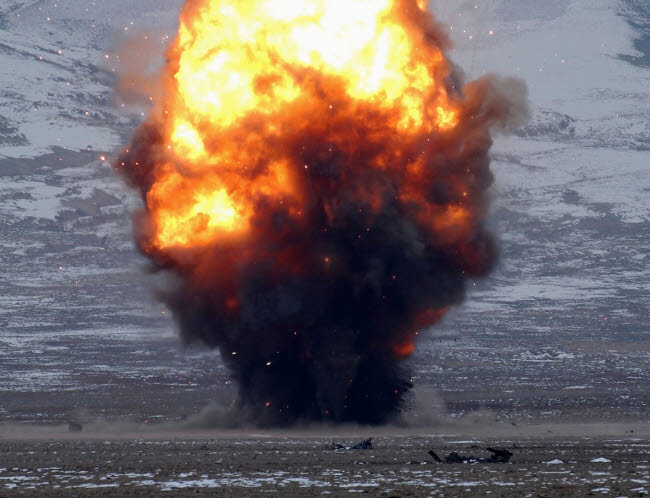 Poster print of an explosion lighting up the sky by Stocktrek Images.