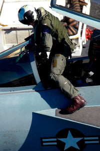 Commander Exits An F/A-18E Super Hornet Aircraft Poster Print by Stocktrek Images